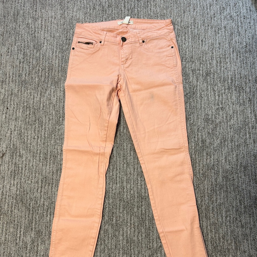 Salmon colored jeans